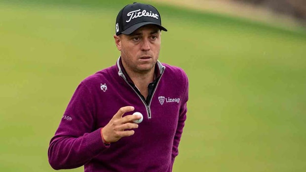 Justin Thomas walks off a green at the 2023 American Express in La Quinta, Calif.